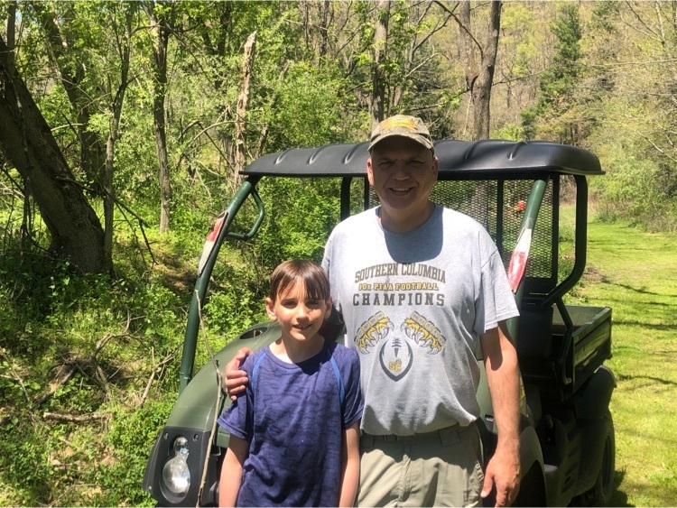 Mr. Williams and his son Michael enjoying nature day.